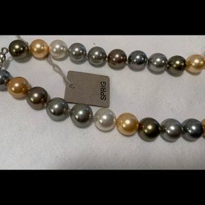 18” string. Approx 1/2 “ fresh water multi colored pearls. Beautiful lus…